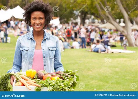 Woman With Fresh Produce Bought At Outdoor Farmers Market Stock Image