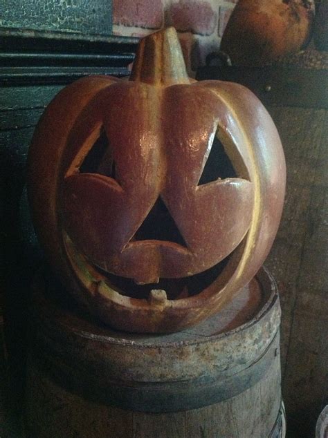 Primitive Jack O Lantern Sittin On An Old Wooden Bucket