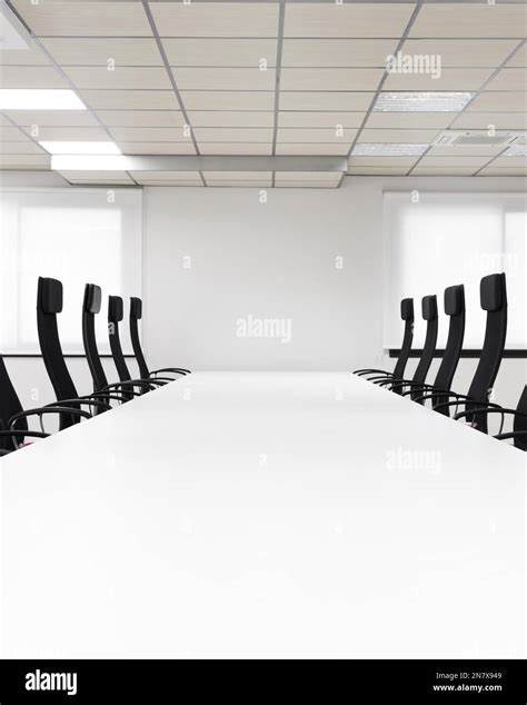 conference room with black chairs Stock Photo - Alamy