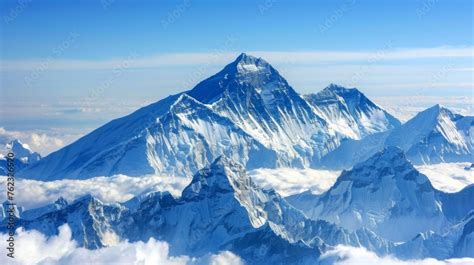 The summit of Mount Everest, covered in snow, stands as the loftiest ...