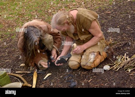 Professional Stoneage reenactors knapping flint at The Museum of Welsh ...