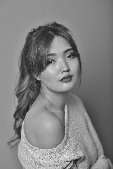 Expressive Portrait Of A Model With A Beautiful Face And Curly Hair