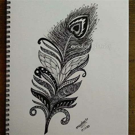 a black and white drawing of a feather