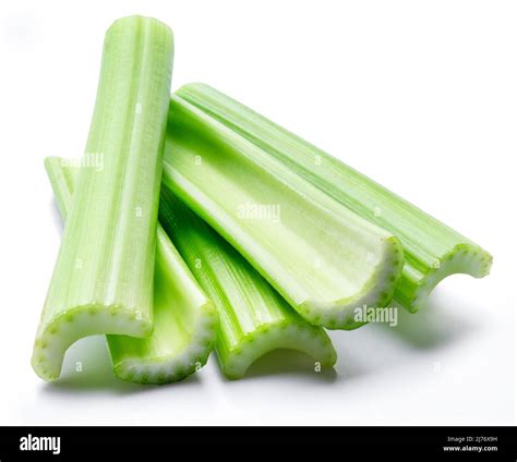 Pile of celery ribs isolated on white background Stock Photo - Alamy