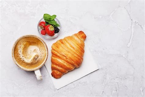 Premium Photo Coffee Cup And Croissant