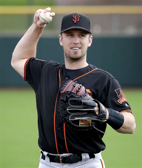 GF Baseball, San Francisco Giants’ Buster Posey warms up during...