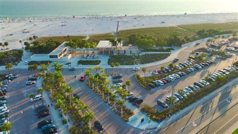 View From Above Of Beachfront Car Parking Area For Tourist Vehicles At