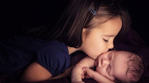 Girl Kiss A Cute Baby While Baby Sleeping Hd Cute Wallpapers Hd