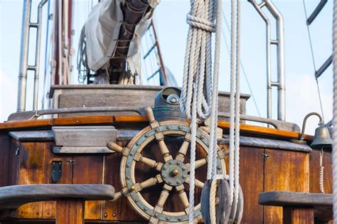 Premium Photo Old Wooden Sailing Ship Closeup Wooden Steering Wheel