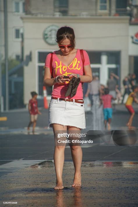 Woman Walks Barefoot In The Hot Weather Of Montreal Photo Getty Images