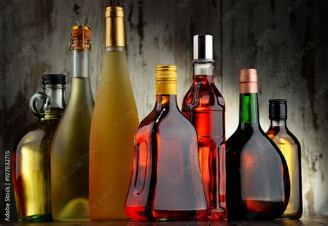 Bottles of assorted alcoholic beverages Stock Photo | Adobe Stock