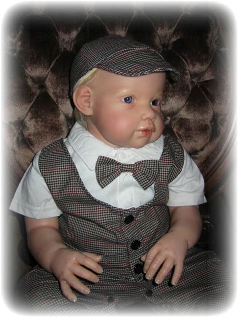 Pin By Dana Anderson On Reborned Dolls Baby Face Fashion Newsboy