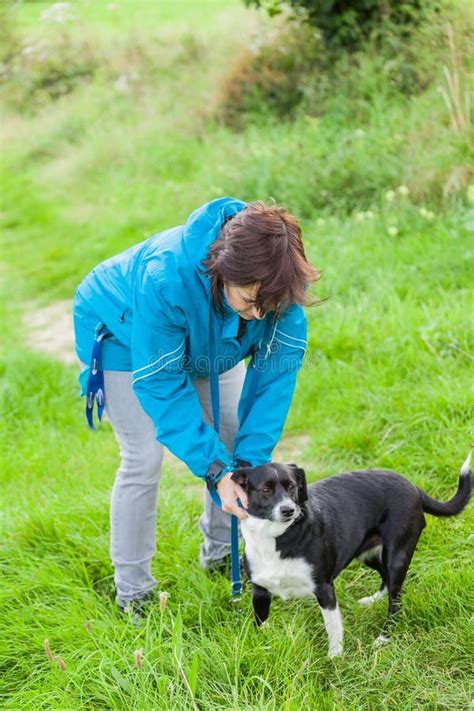 Woman With Her Dog On Leash Stock Photo Image Of Isolated Leash