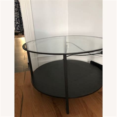 IKEA Modern Round Glass-Top Black Coffee Table - AptDeco