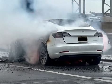 Green Inferno Tesla Model 3 Engulfed In Flames After Hitting Debris On