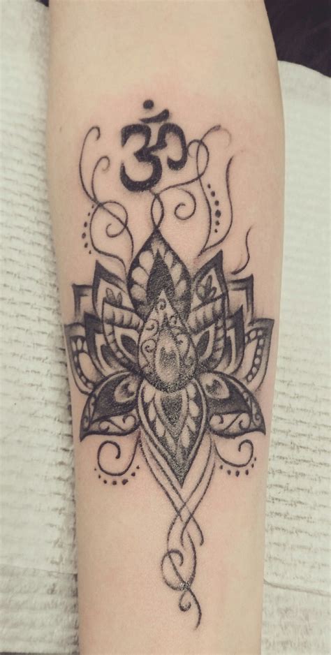 Lotus Mandala OM Symbol Tattoo On Forearm Done By Esther At Twisted By