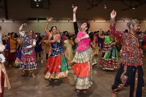 Girls Man Women Are Performing Garba And Dandiya Dance Wearing