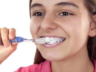 How Do You Brush Your Teeth With Braces? — Lund Orthodontics