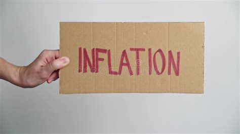 World Inflation Concept Woman Hold Sheet With Word Inflation Stock