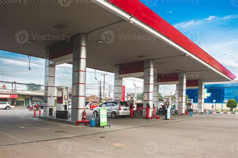 Gas station under the clear blue sky in Indonesia. Car refueling at gas ...