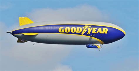 Wingfoot Three Flies Over The Goodyear Air Hangar