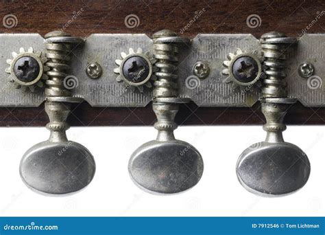 Three guitar tuning keys stock photo. Image of detail - 7912546