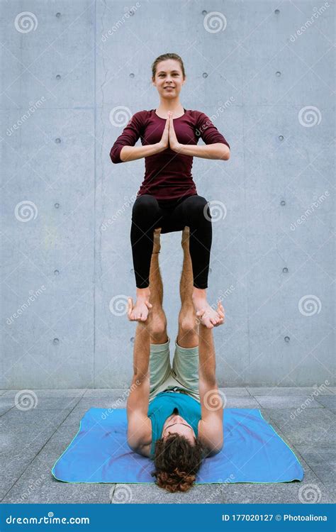 Couple Practicing Acro Yoga Outdoors Acroyoga Concept Throne Pose Stock Image Image Of Pose