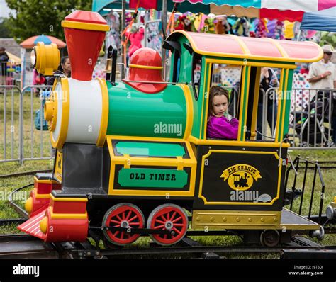 Children on a train ride at the county fair Stock Photo - Alamy