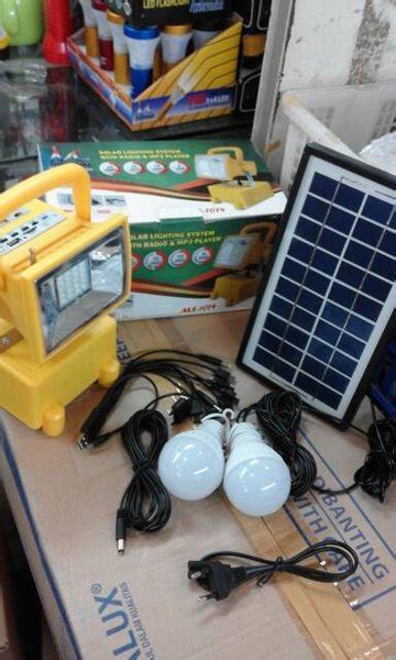 Jual Lampu Sorot Tembak Solar Panel Cell Lighting System With Radio