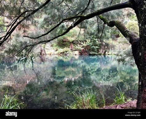 Blue lake at the Jenolan Caves Australia Stock Photo - Alamy