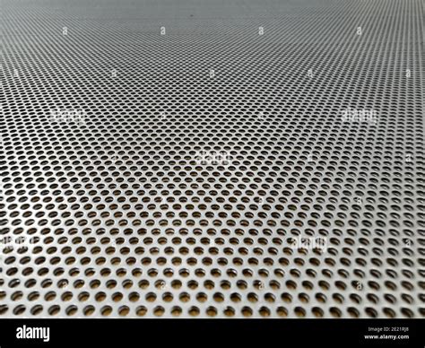 Sheet Of A Perforated Stainless Steel Ideal For Industrial Brochures