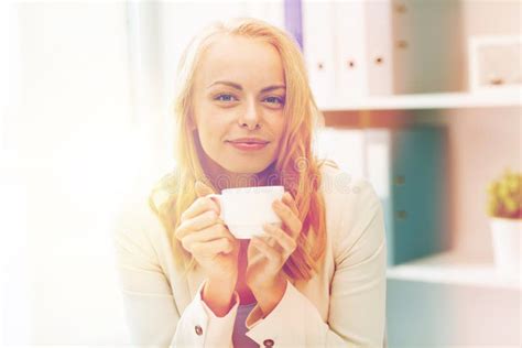 Happy Businesswoman Drinking Coffee At Office Stock Image Image Of