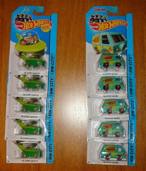 Lot Of Hot Wheels Scooby Doo Mystery Machines And Jetsons Capsule