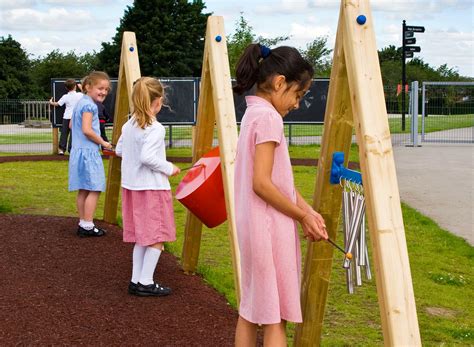 Making playground music with outdoor musical instruments