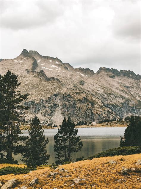 Mountains Lake Trees Stones Sky Hd Phone Wallpaper Peakpx