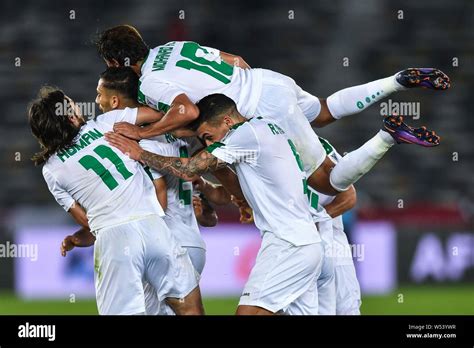 Players of Iraq national football team celebrate after scoring against ...