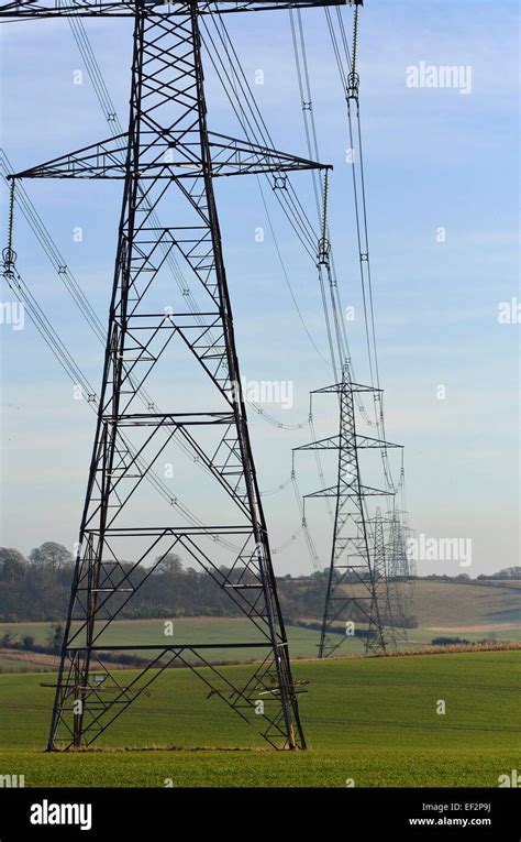 Electricity Pylons Cables Over The English Countryside Stock Photo