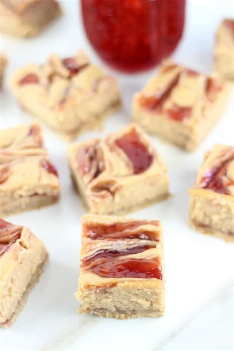 Peanut Butter And Jelly Swirl Cheesecake Bars Food Fanatic