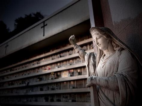 Premium Photo Statue Of St Mary In Cemetery