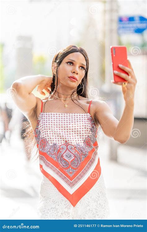 Trans Woman Taking A Selfie While Posing Sensual Outdoors Stock Image