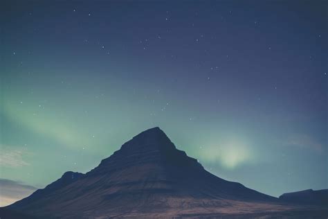 Northern lights mountain night sky. | Free Photo - rawpixel