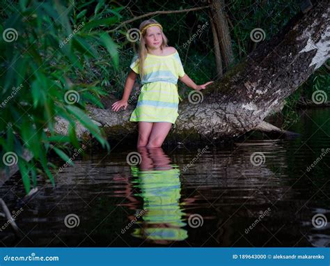 Blonde Girls With Blue Eyes On The Lake At Sunset Stock Photo Image Of Beauty Female 189643000