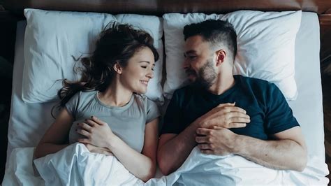 Premium Photo Husband And Wife Staying Together In Bed