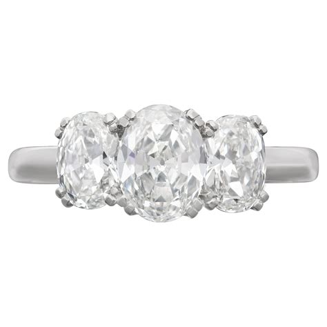 Tiffany and Co. Oval Brilliant Cut Diamond Platinum Three Stone Ring at ...