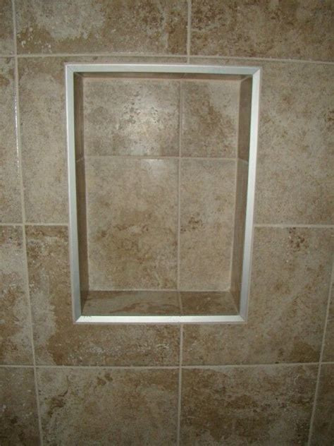 Custom niche bordered with brushed nickel schluter | Shower niche ...