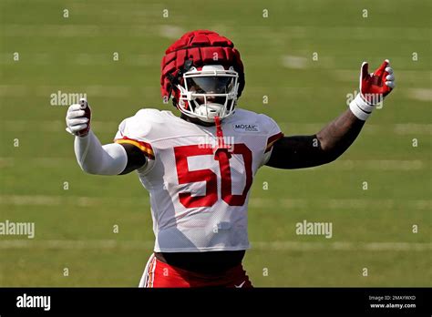 Kansas City Chiefs Linebacker Willie Gay Motions To A Teammate During