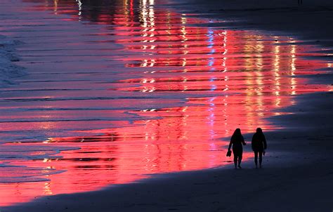 Photos | A fiery sunset backdrop in Santa Cruz – Santa Cruz Sentinel