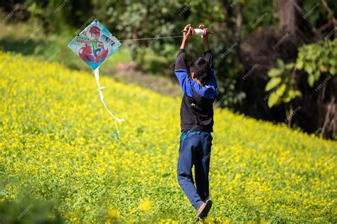 Premium Photo | Kids flying kites as nepalese people's biggest festival ...