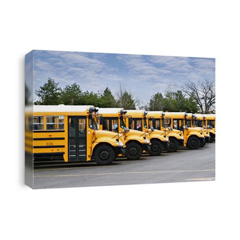 Line Of Yellow School Buses Canvas Print Canvasworld