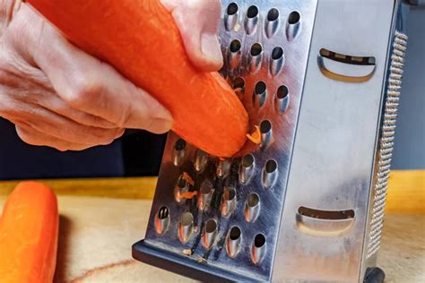 Grating vegetables Stock Photos, Royalty Free Grating vegetables Images ...